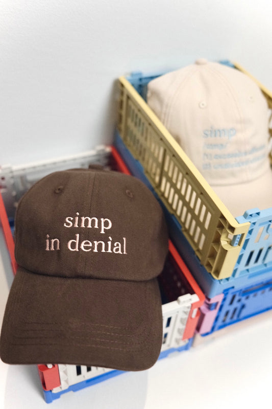 “Denial” embroidery cap