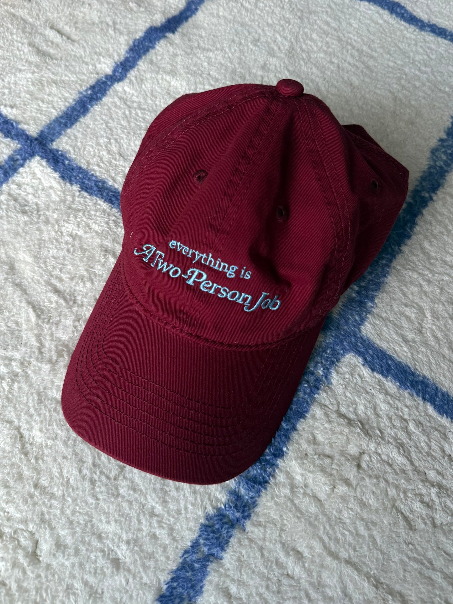 Everything is a two person job embroidery cap