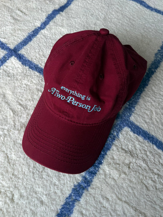 Everything is a two person job embroidery cap