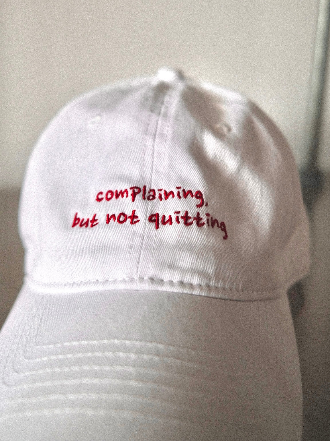"Complaining but not quitting" embroidery cap (pre-order)